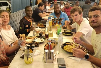 Enjoying dinner in Uganda